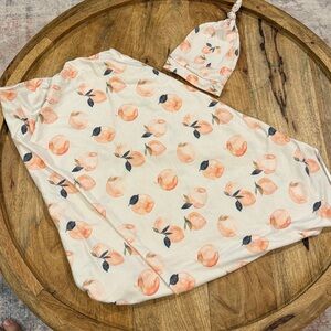 Copper pearl swaddle and hat in Caroline